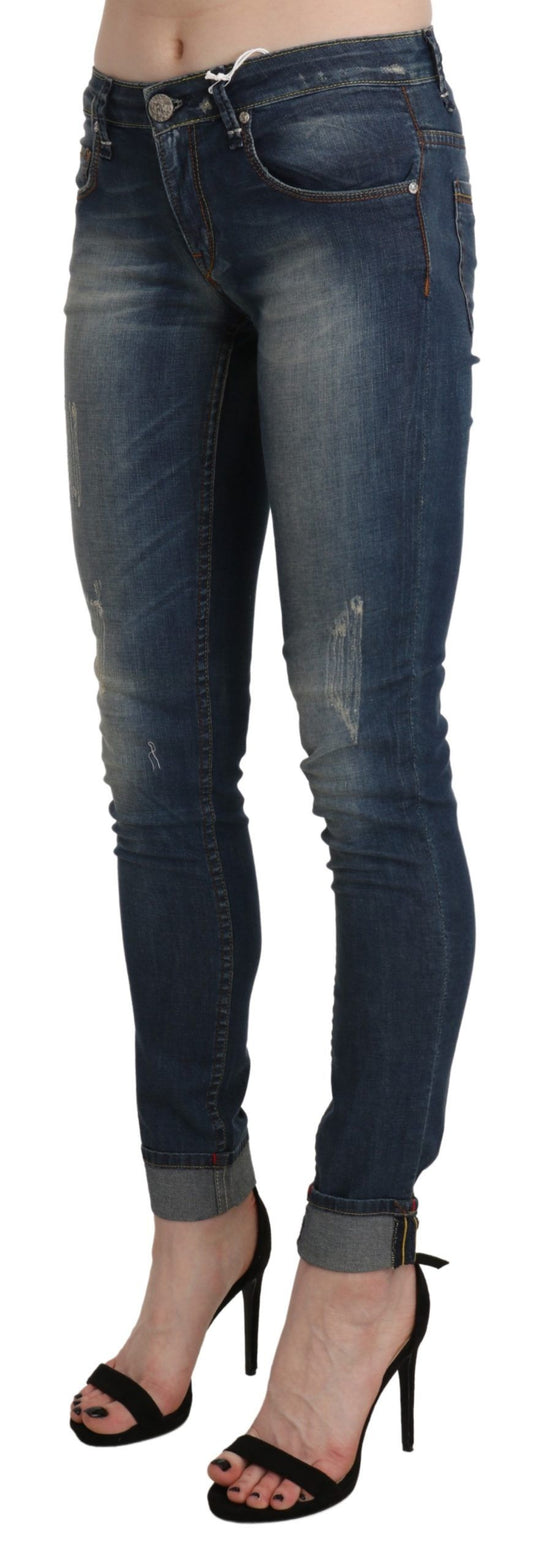 Acht Blå Tvättade Låg Midja Skinny Cropped Denimbyxor
