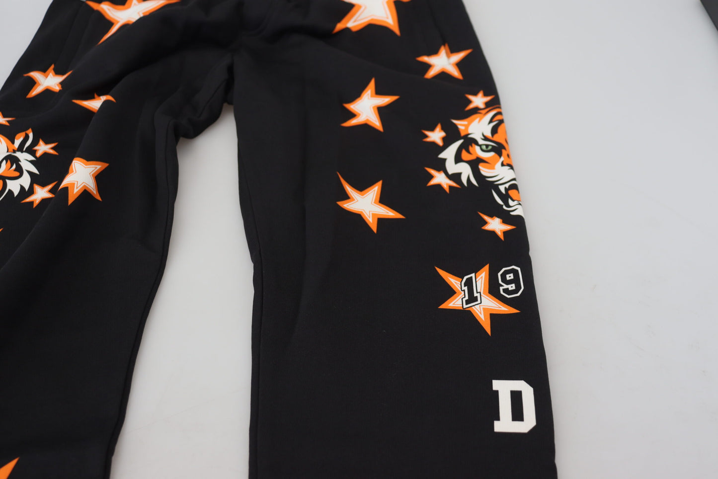 Dolce & Gabbana Svarta Orange Stjärnbyxor Sportbyxor