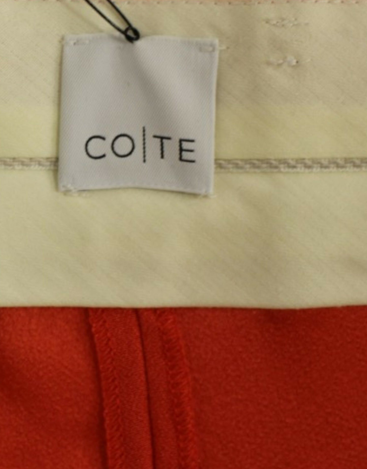 CO|TE Orangea stretchbyxor med boyfriend-motiv