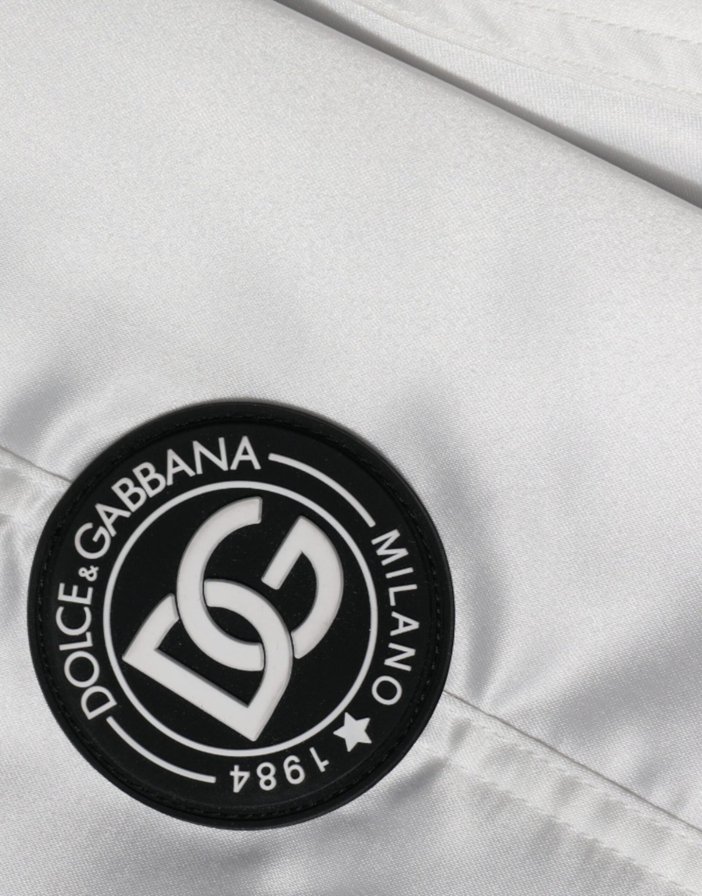 Dolce & Gabbana vit bomberjacka med polyesterlogotyp och dragkedja