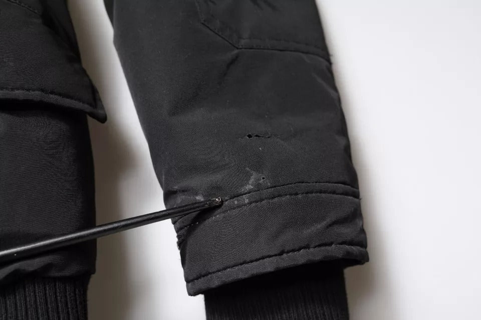 Woolrich svart hettejakke med lange ermer og pelsfrakk