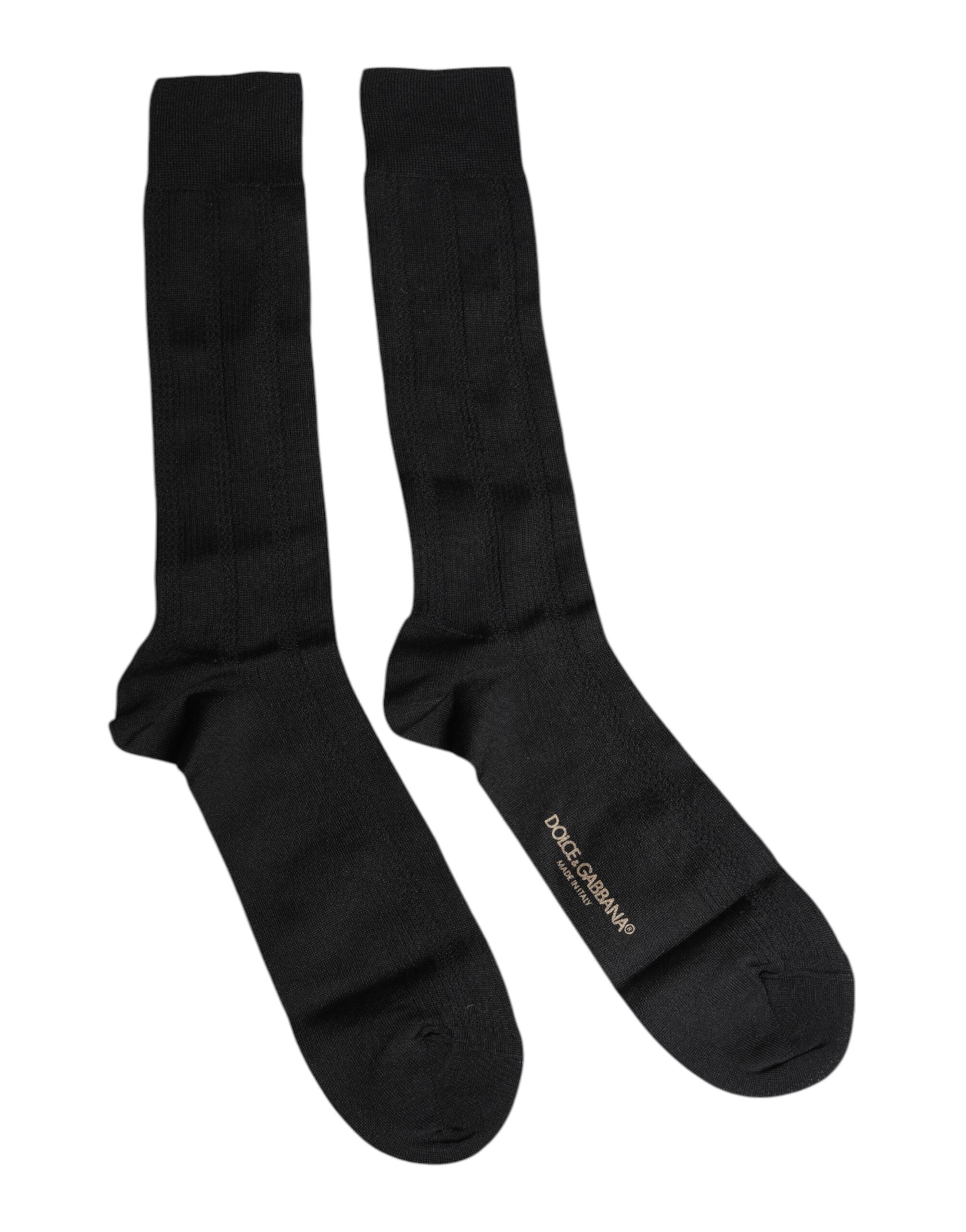 Svarta stretchiga logotypstrumpor med mitten av vaden