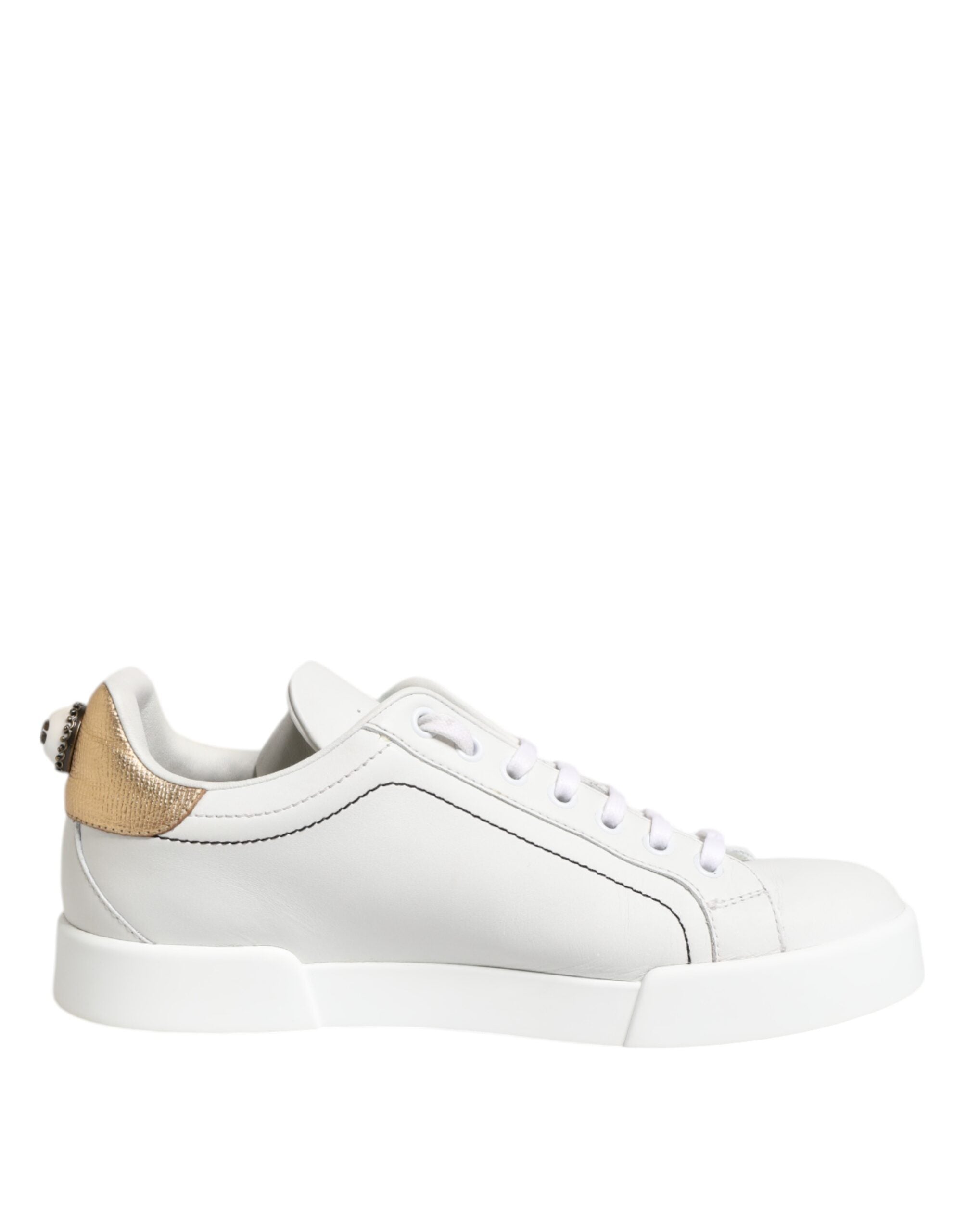 Låga sneakers i läder i vitguld
