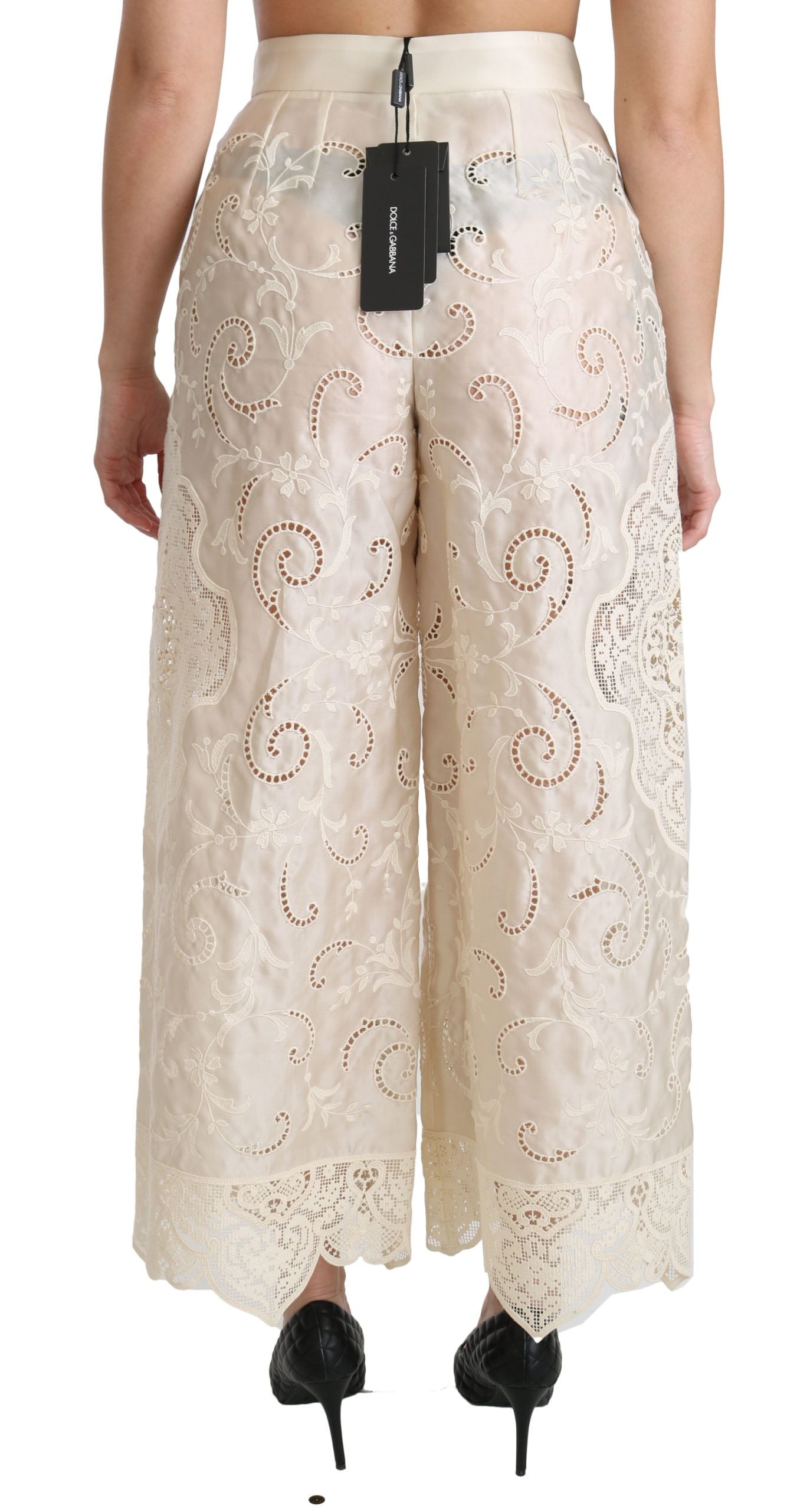 Krämfärgade spetsbyxor med hög midja och palazzo-motiv