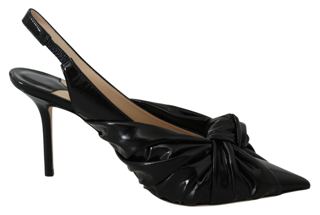 Eleganta svarta pumps med spetsiga tå i läder