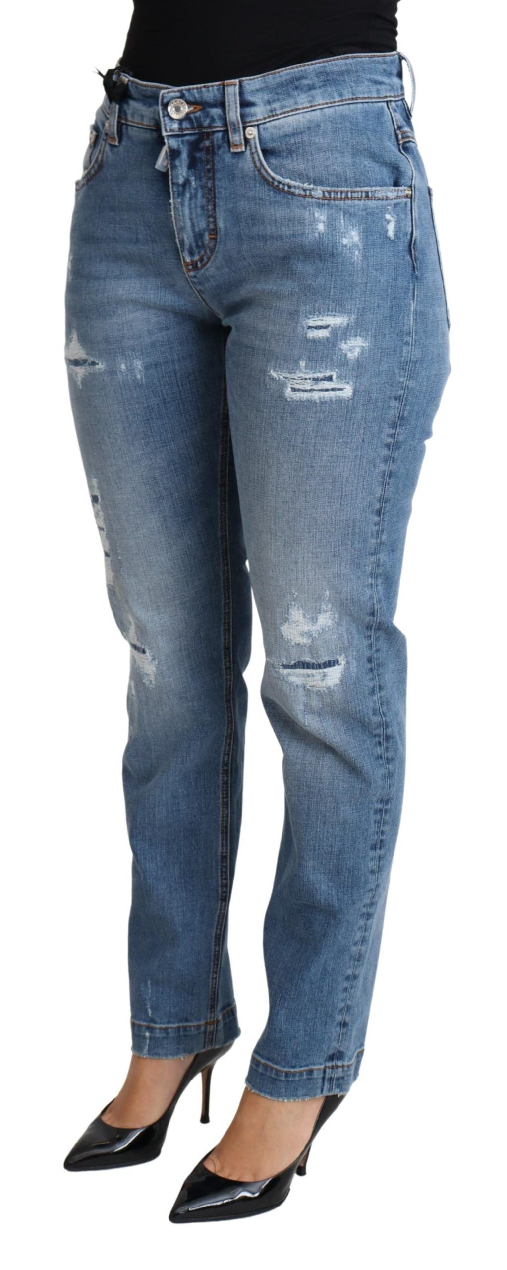 Blåa, slitna, smala denimjeans i bomullsblandning