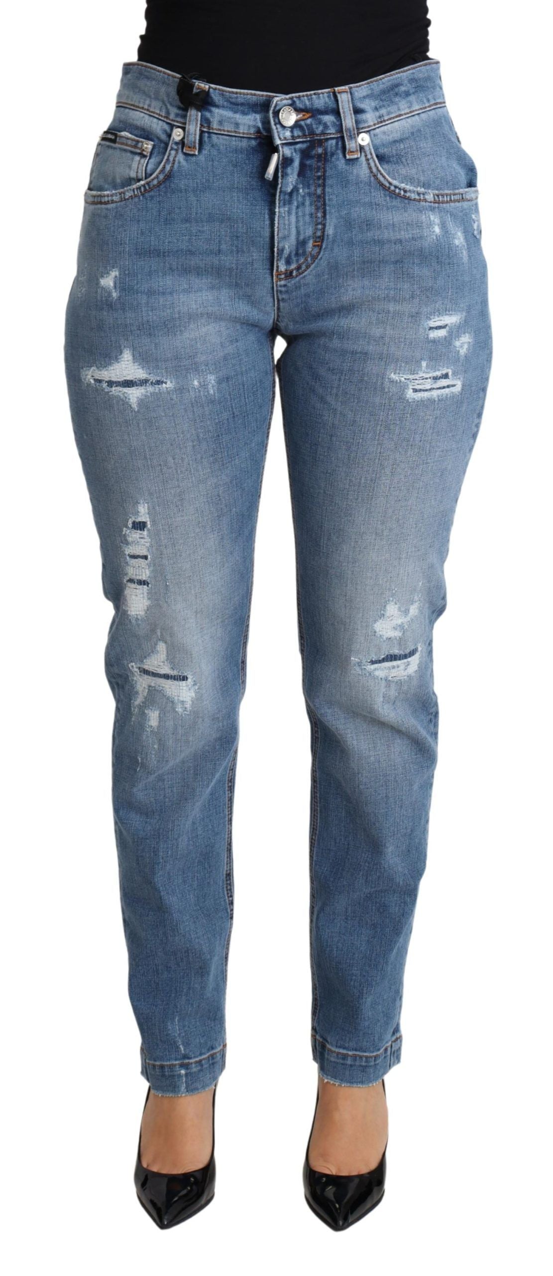 Blåa, slitna, smala denimjeans i bomullsblandning