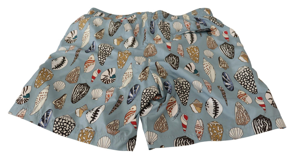 Blå snäckskal badkläder badshorts