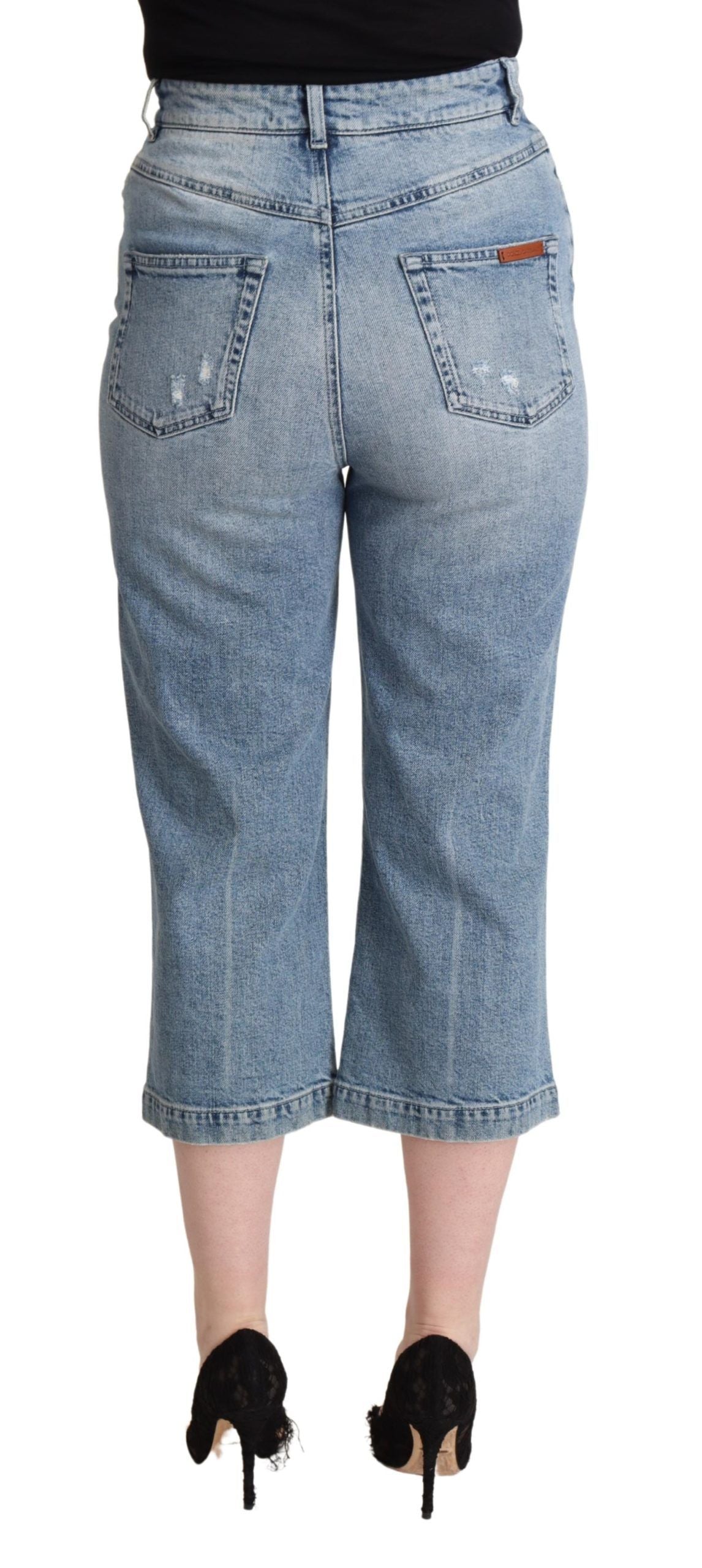 Blåa slitna bomullsdenim Capri-jeans