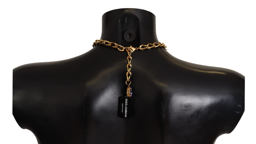 Halsband med hängen i guldmässing med kristaller och lila rosa pärlor