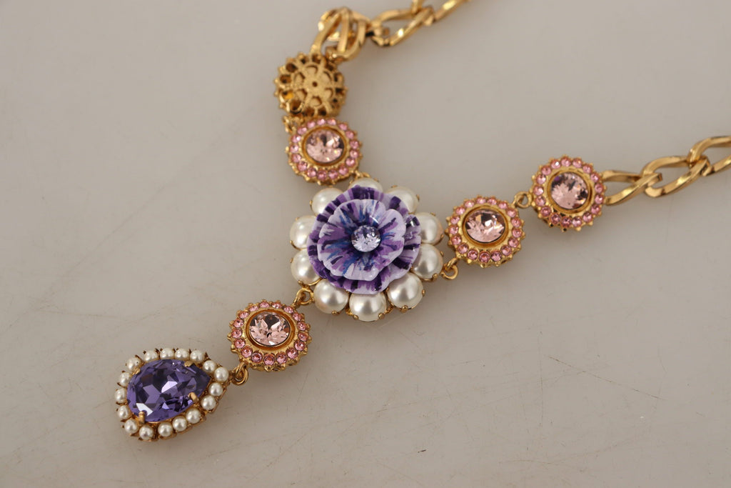 Halsband med hängen i guldmässing med kristaller och lila rosa pärlor