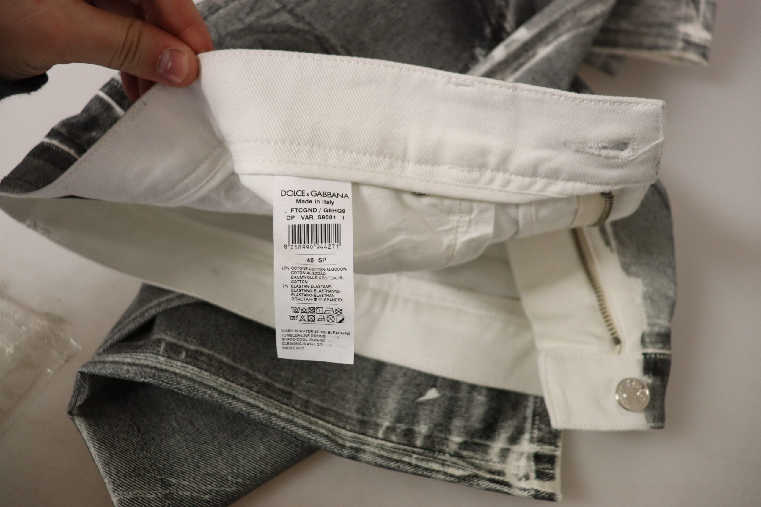 Grå tvättade högmidjade denimbyxor i bomull