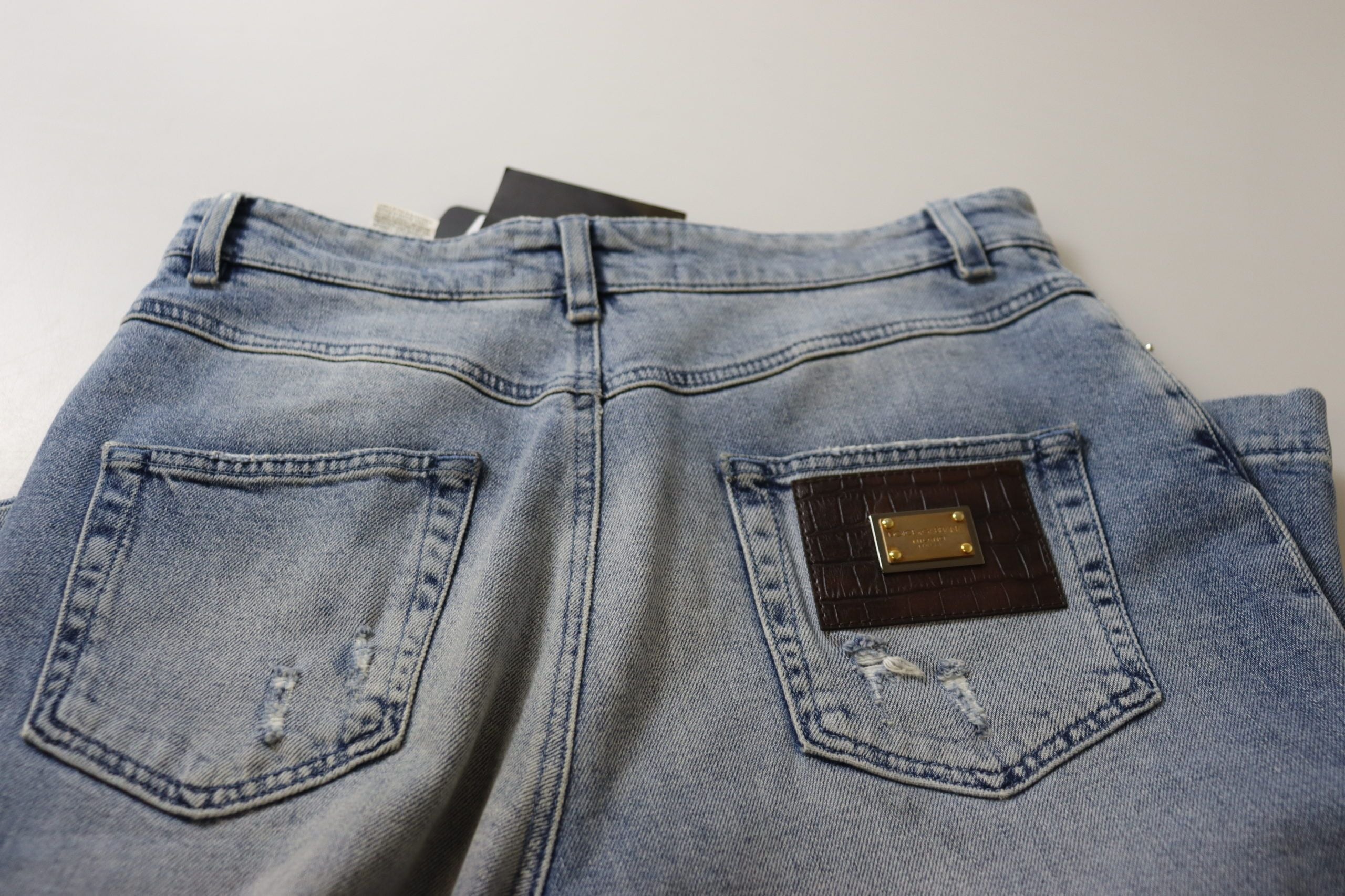 Blå tvättade högmidjade cropped denimjeans