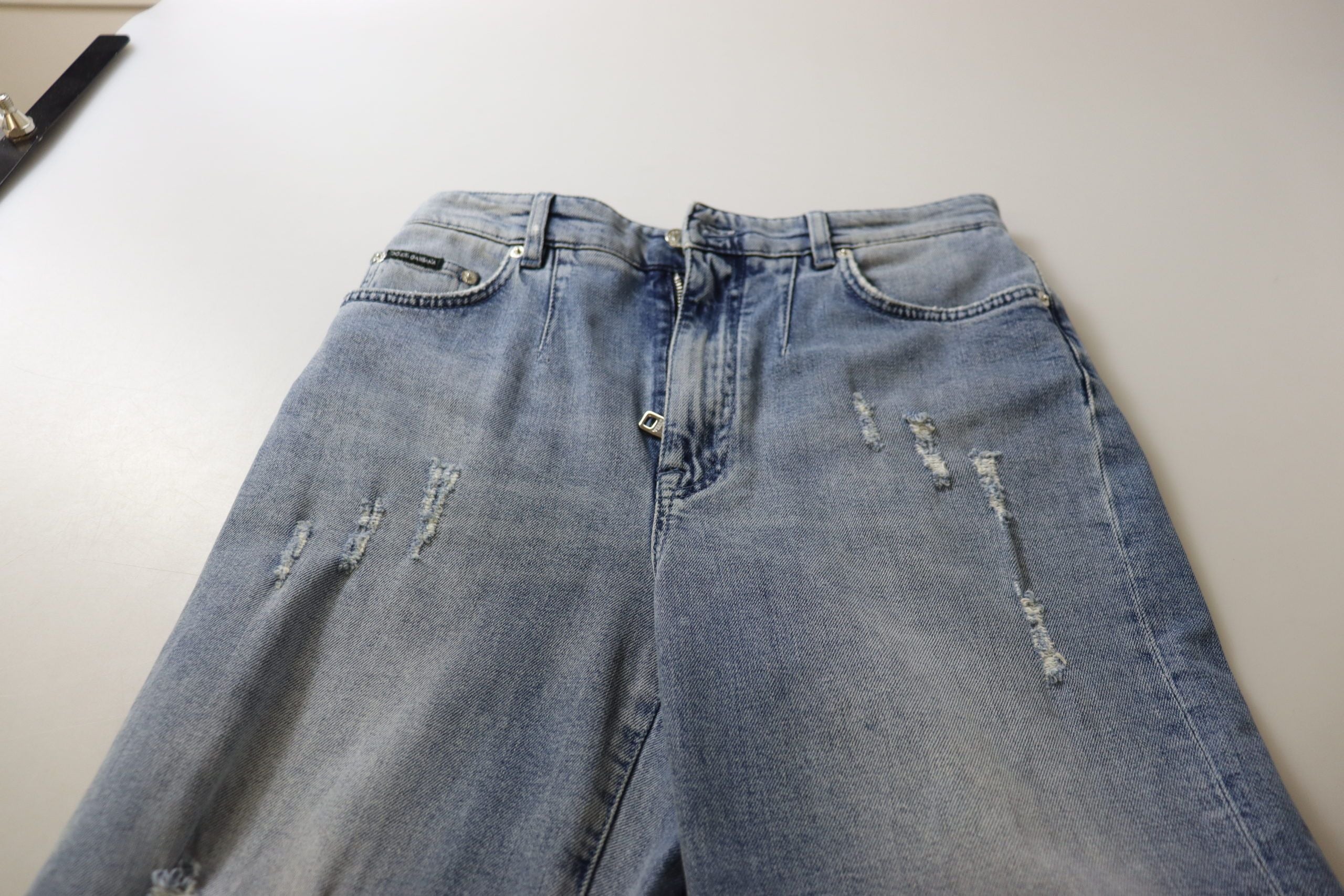 Blå tvättade högmidjade cropped denimjeans