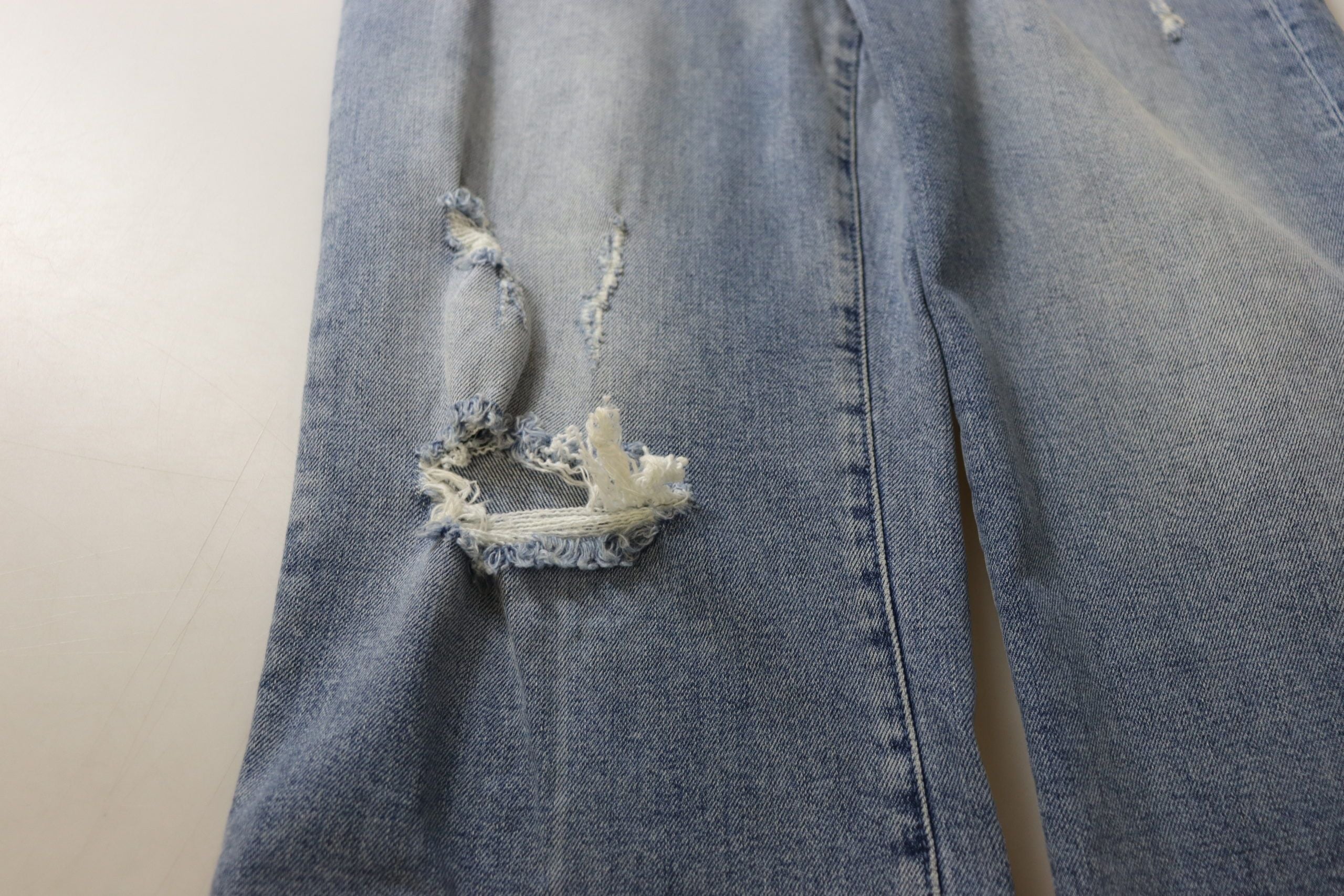 Blå tvättade högmidjade cropped denimjeans