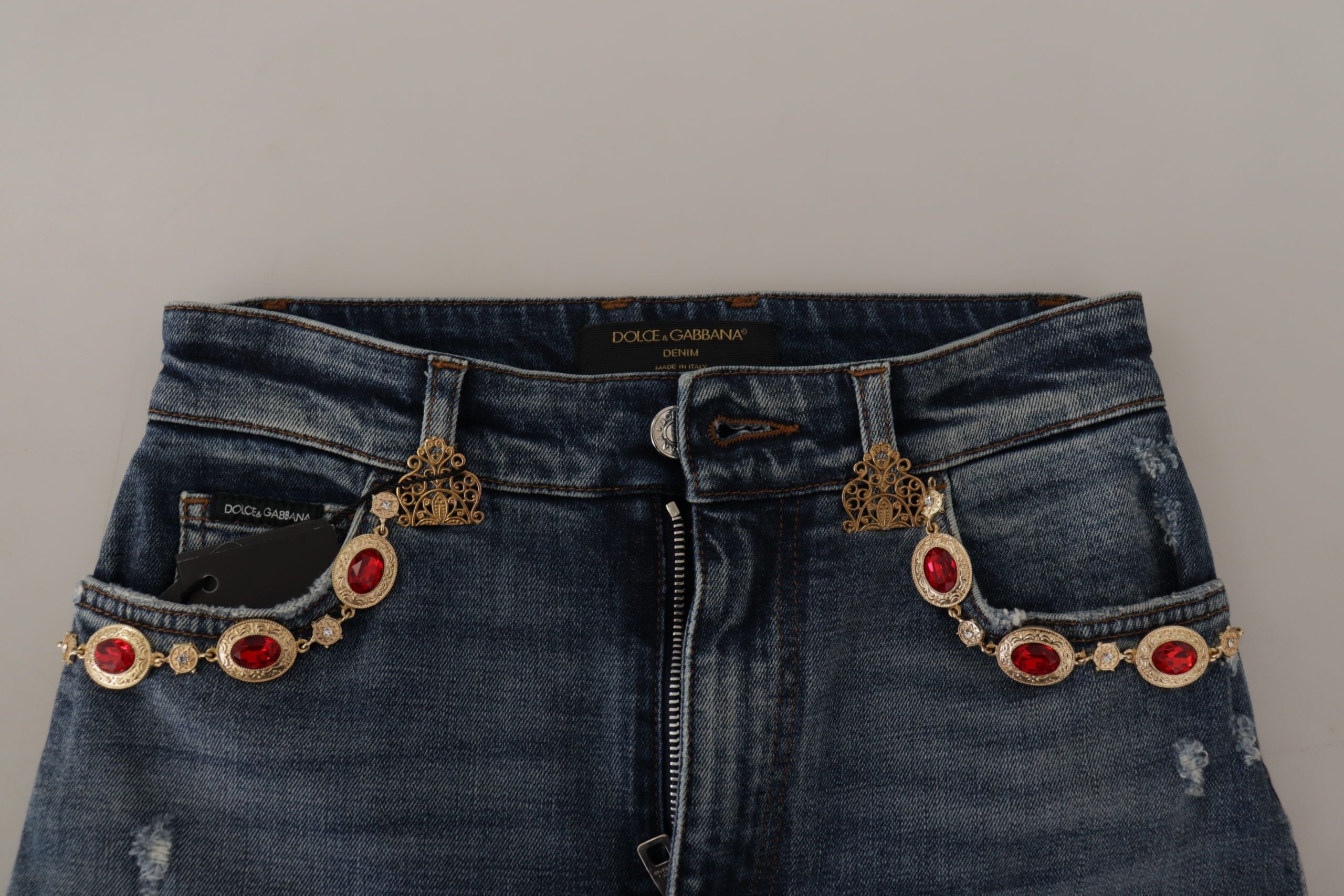 Blå denimbyxor med kristallutsmyckning och jeans