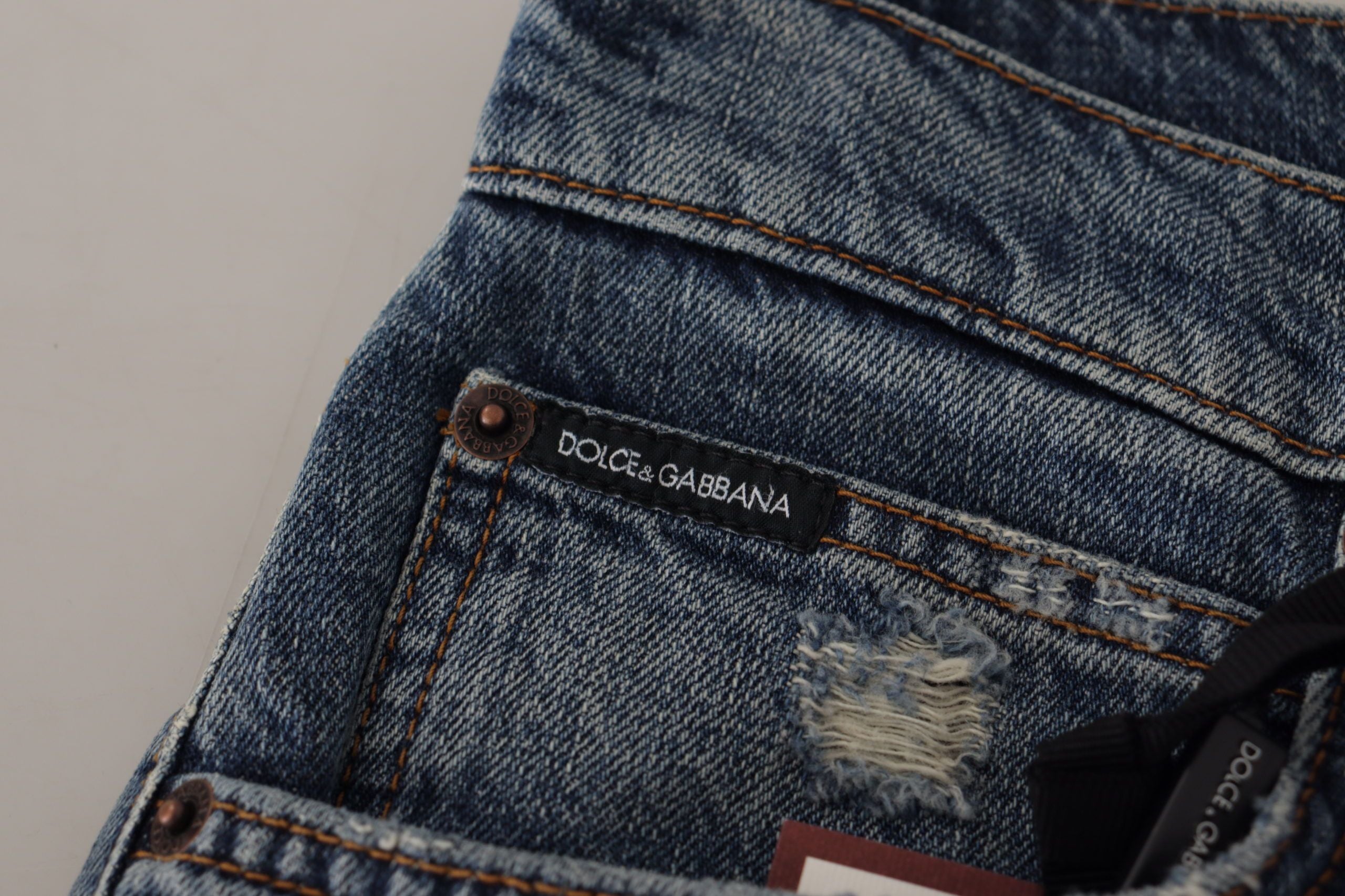 Blå denimbyxor med barockt hjärta och logotypmärke