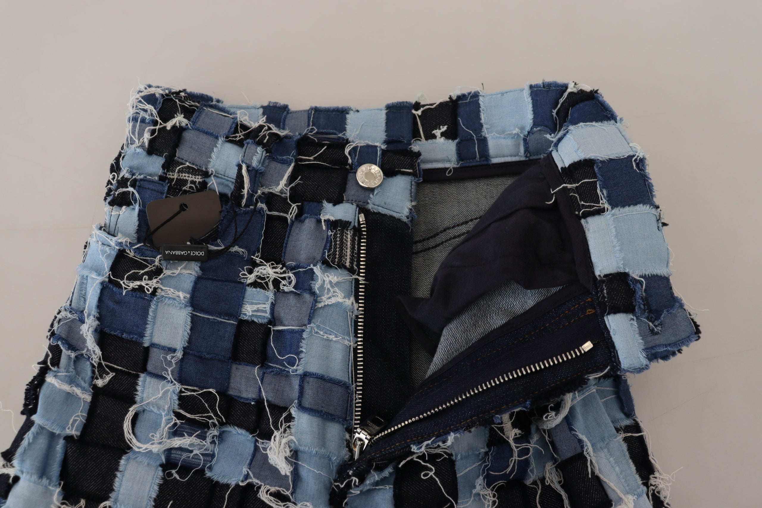 Flerfärgade lapptäcksmönster i bomull med denim