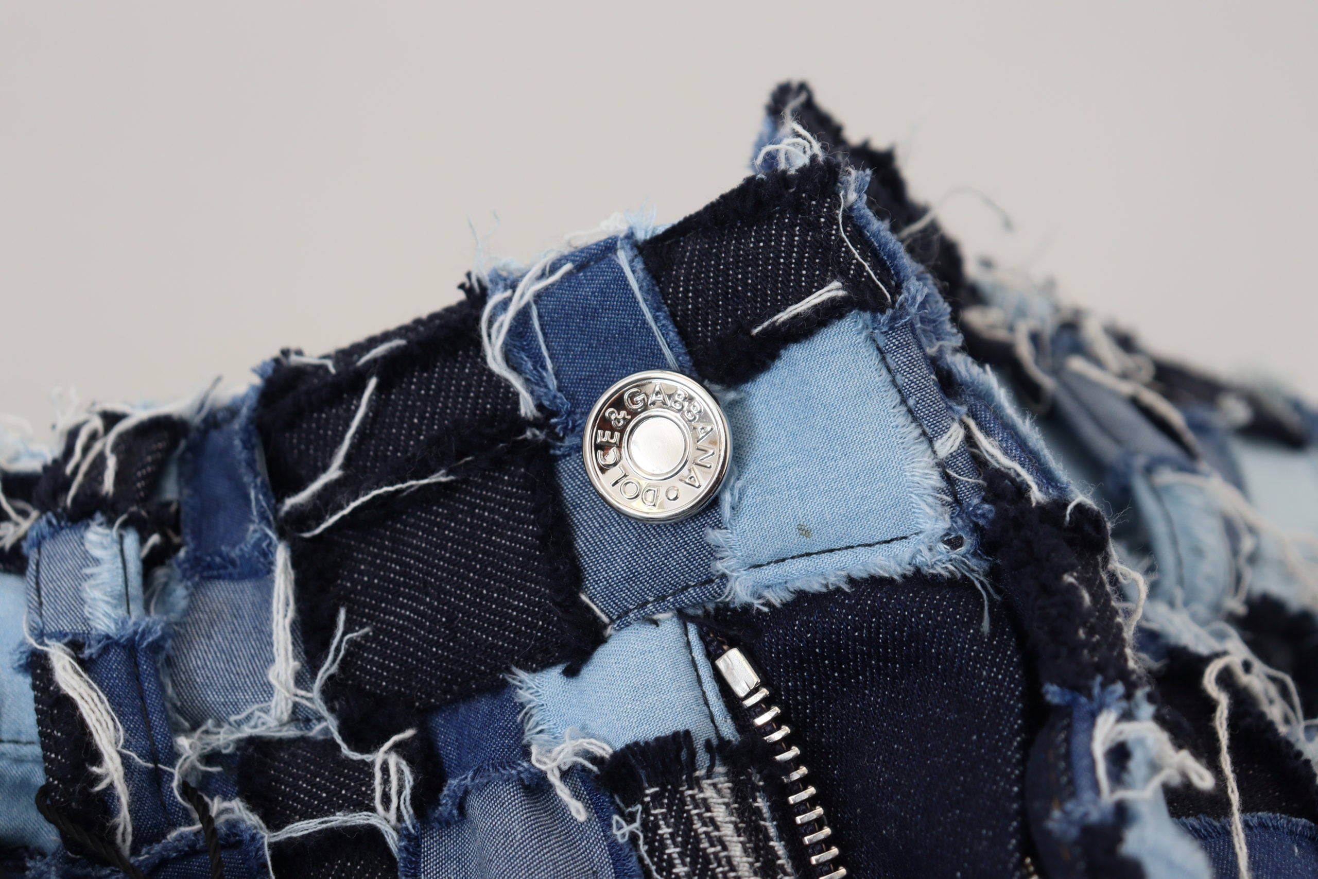 Flerfärgade lapptäcksmönster i bomull med denim