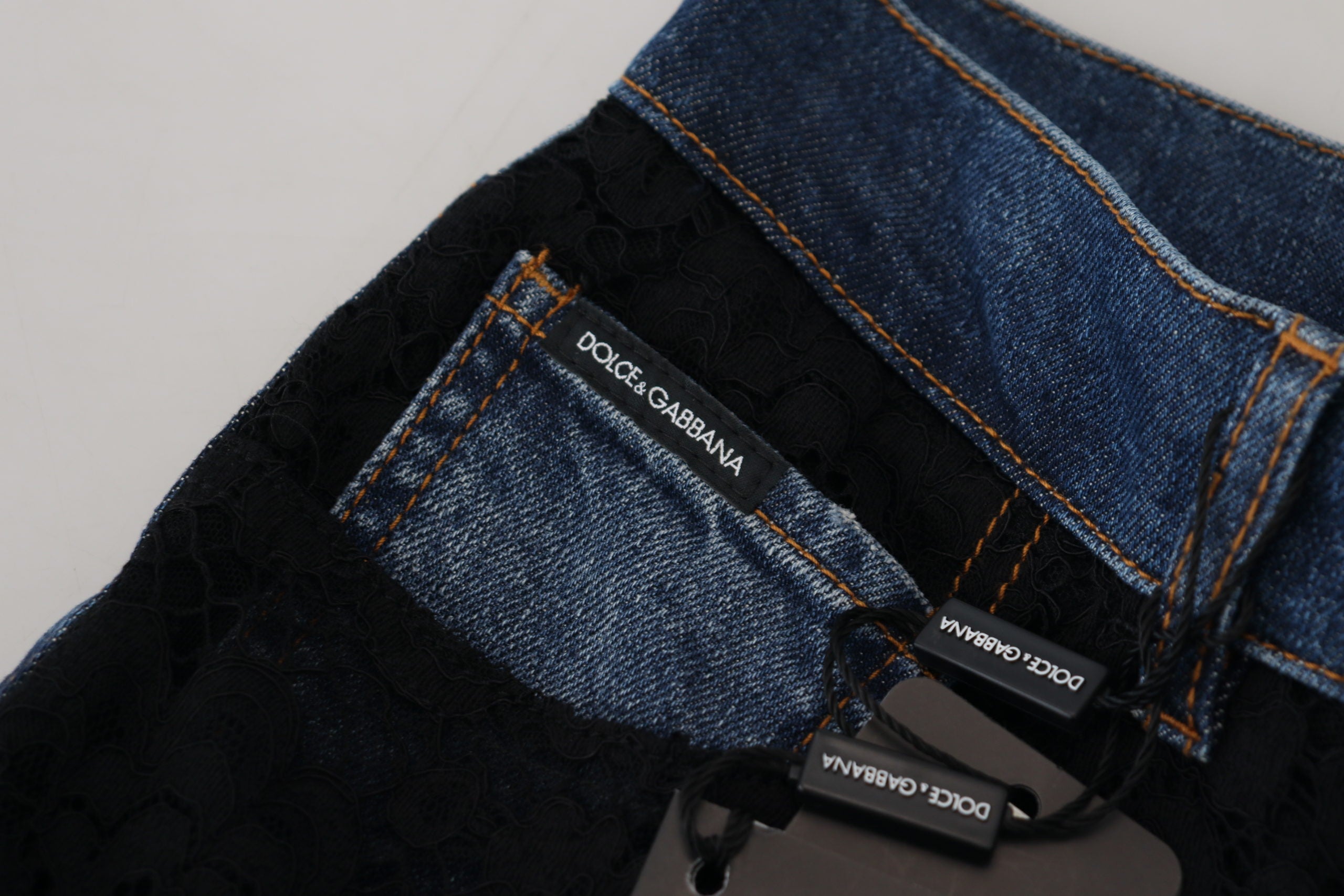 Svarta blommiga skinny jeans med spets framtill