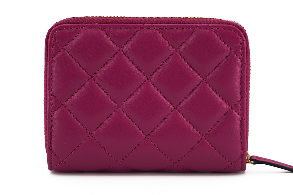 Elegant lilla quiltet skinnlommebok