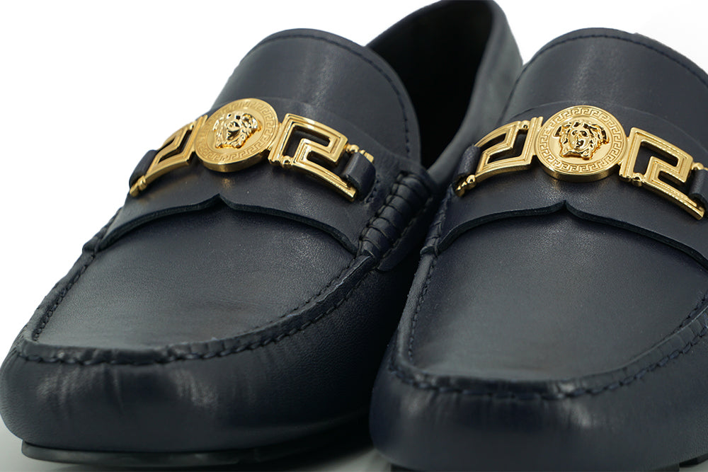 Eleganta marinblå loafers i kalvskinn