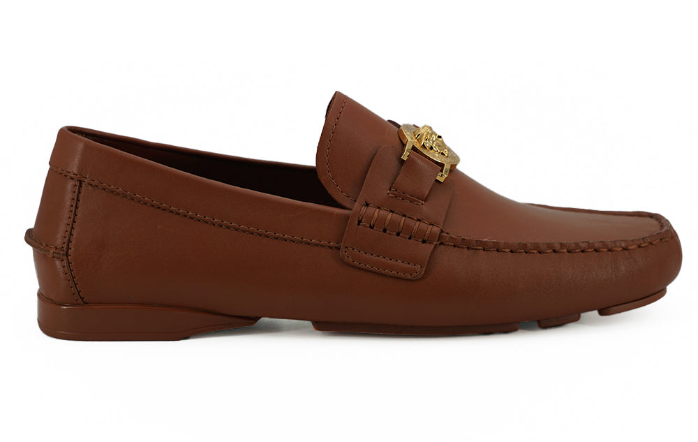 Eleganta Medusa-präglade läderloafers
