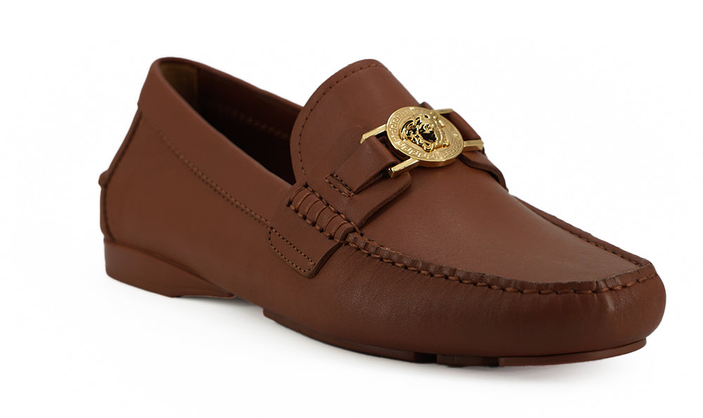 Eleganta Medusa-präglade läderloafers