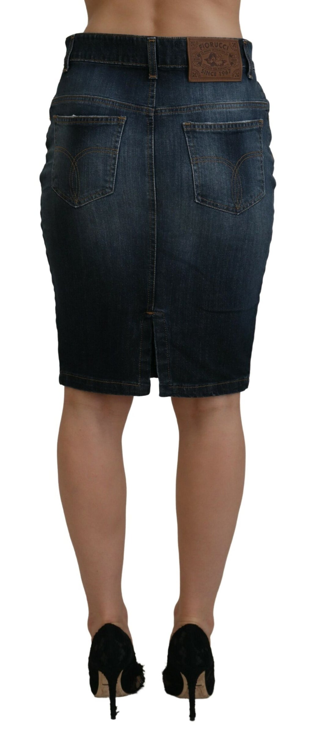 Mörkblå tvättad denimkjol med medelhög midja och pennskuren design