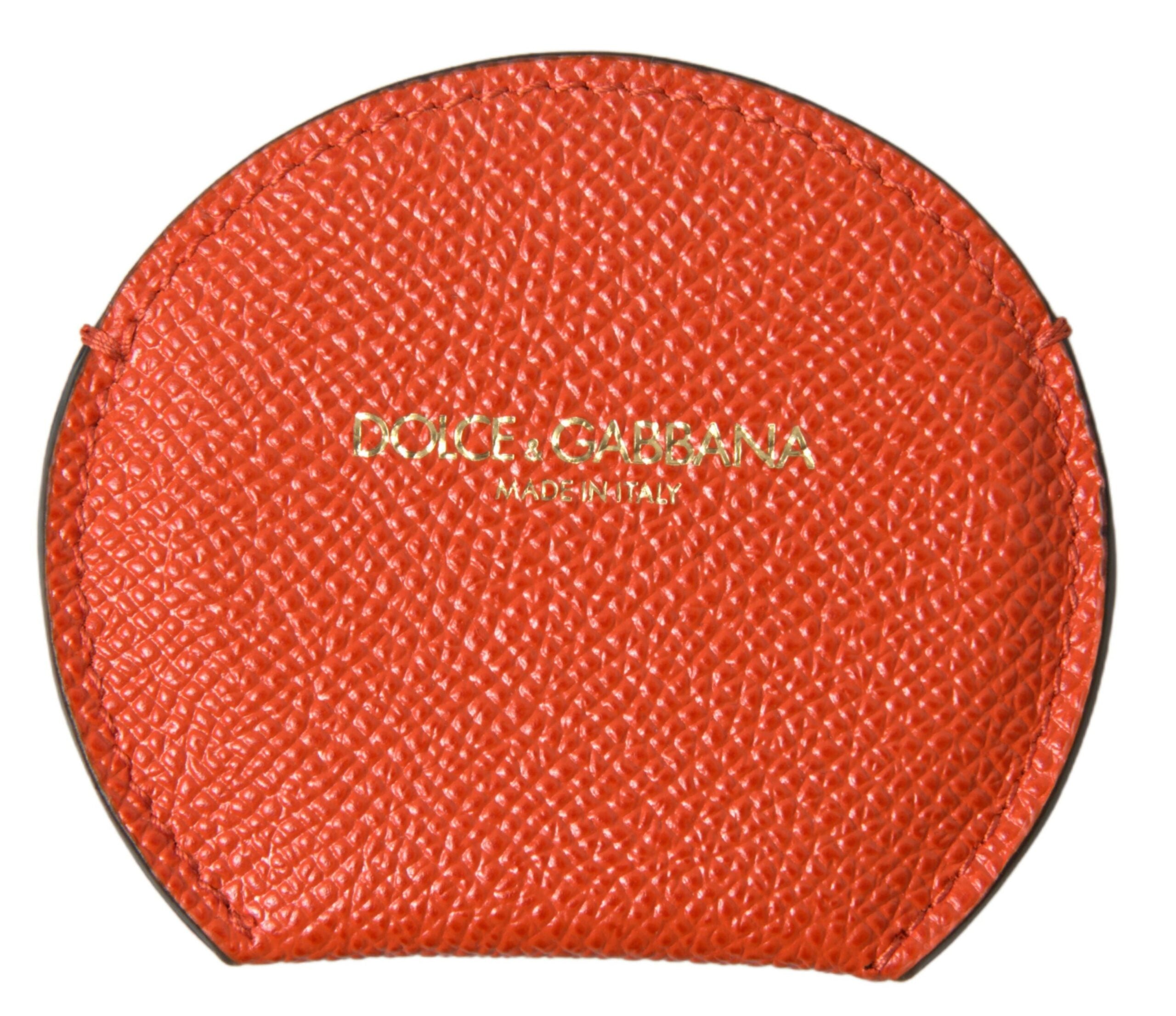 Orange rund handspegelhållare i kalvskinnsläder med logotyp