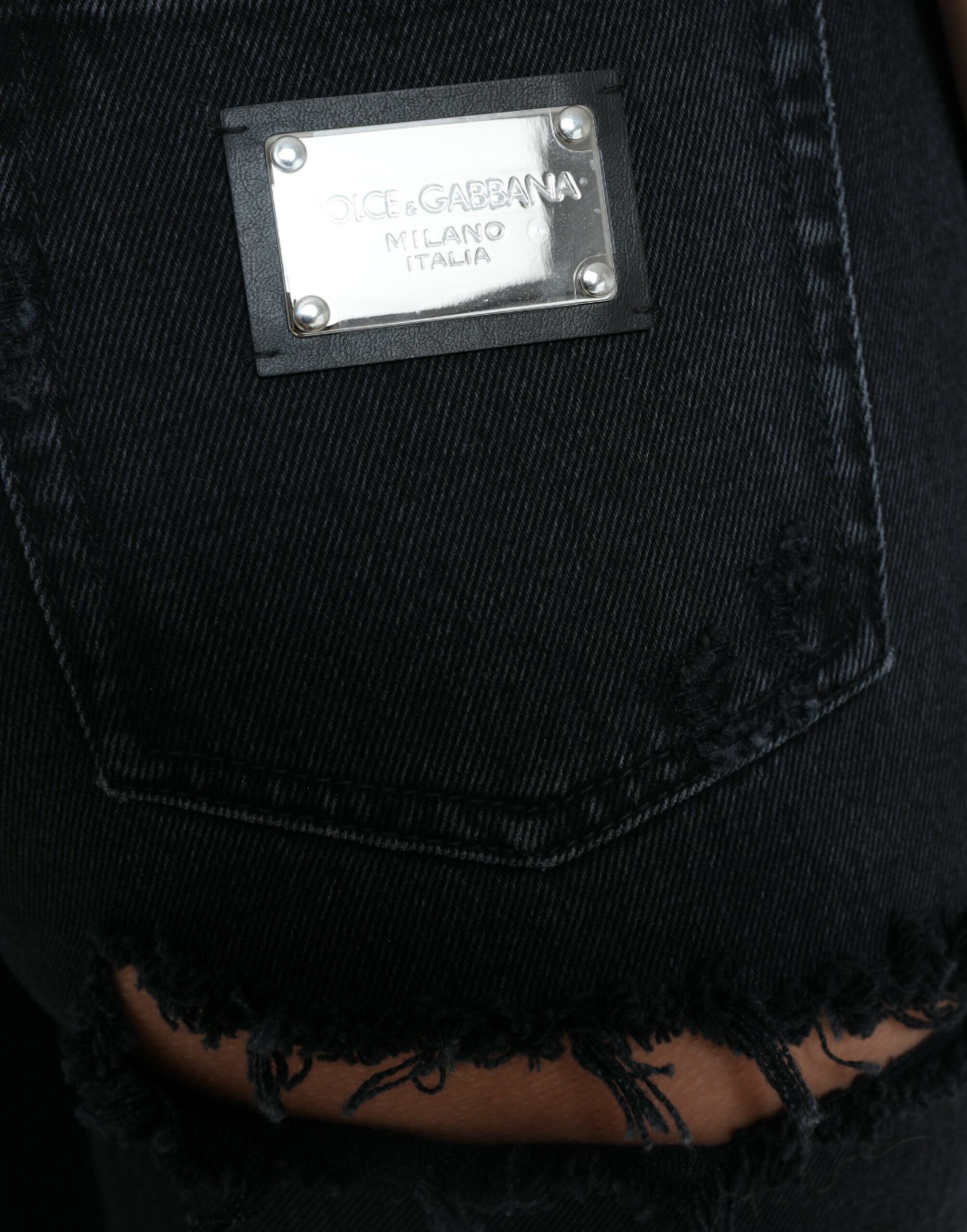 Svarta bomullsjeans med hög midja och slitna denim