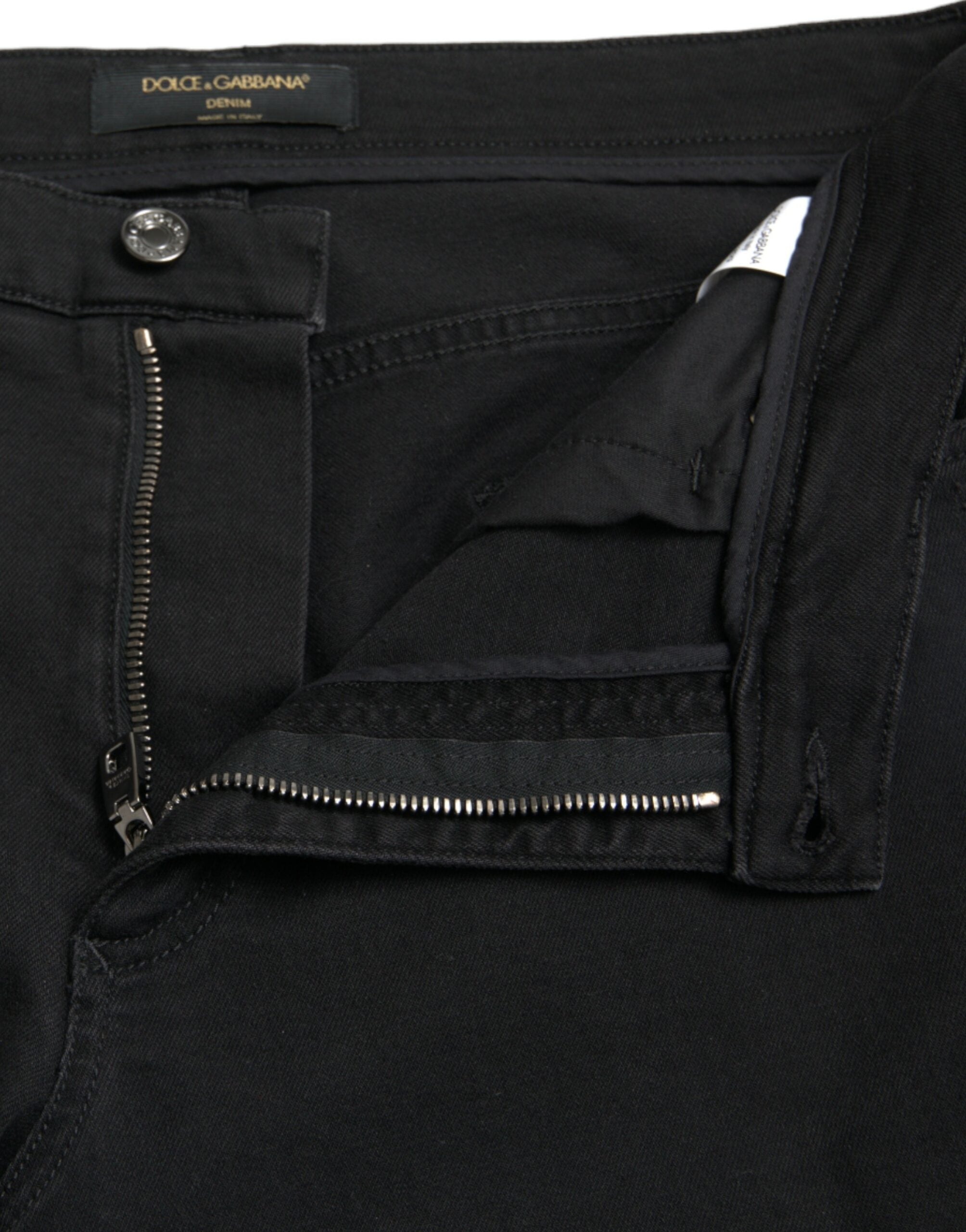 Svarta bomullsjeans med hög midja och slitna denim
