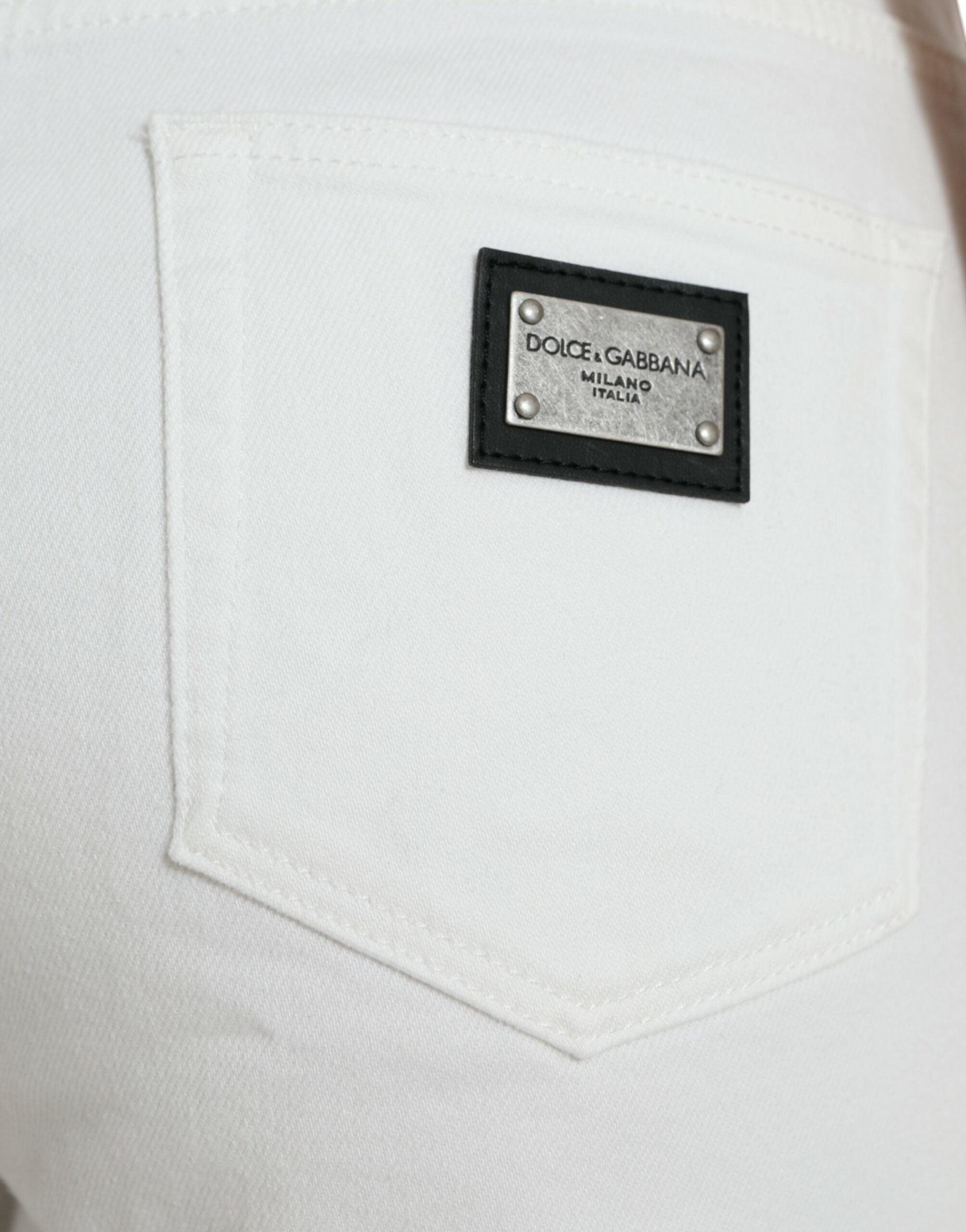 Vita bomullsbeskurna jeans med vida ben