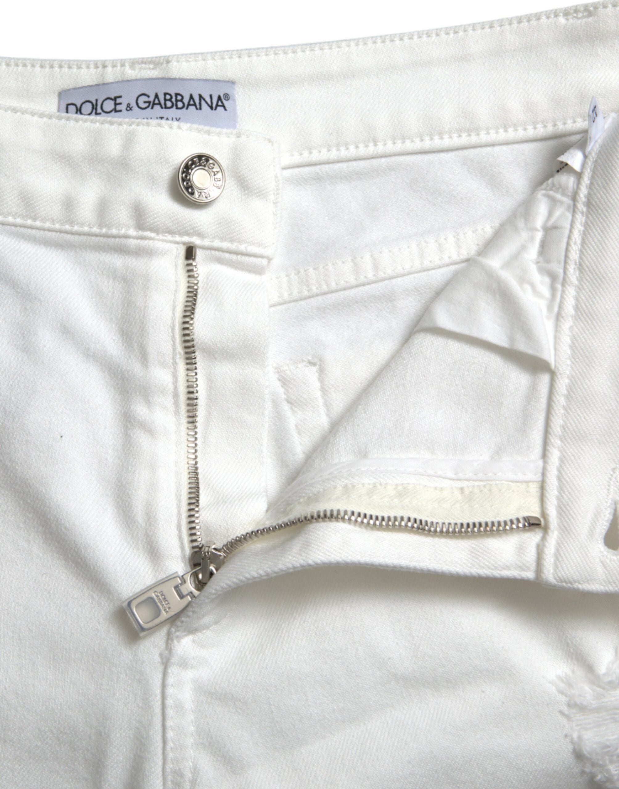 Vita bomullsbeskurna jeans med vida ben