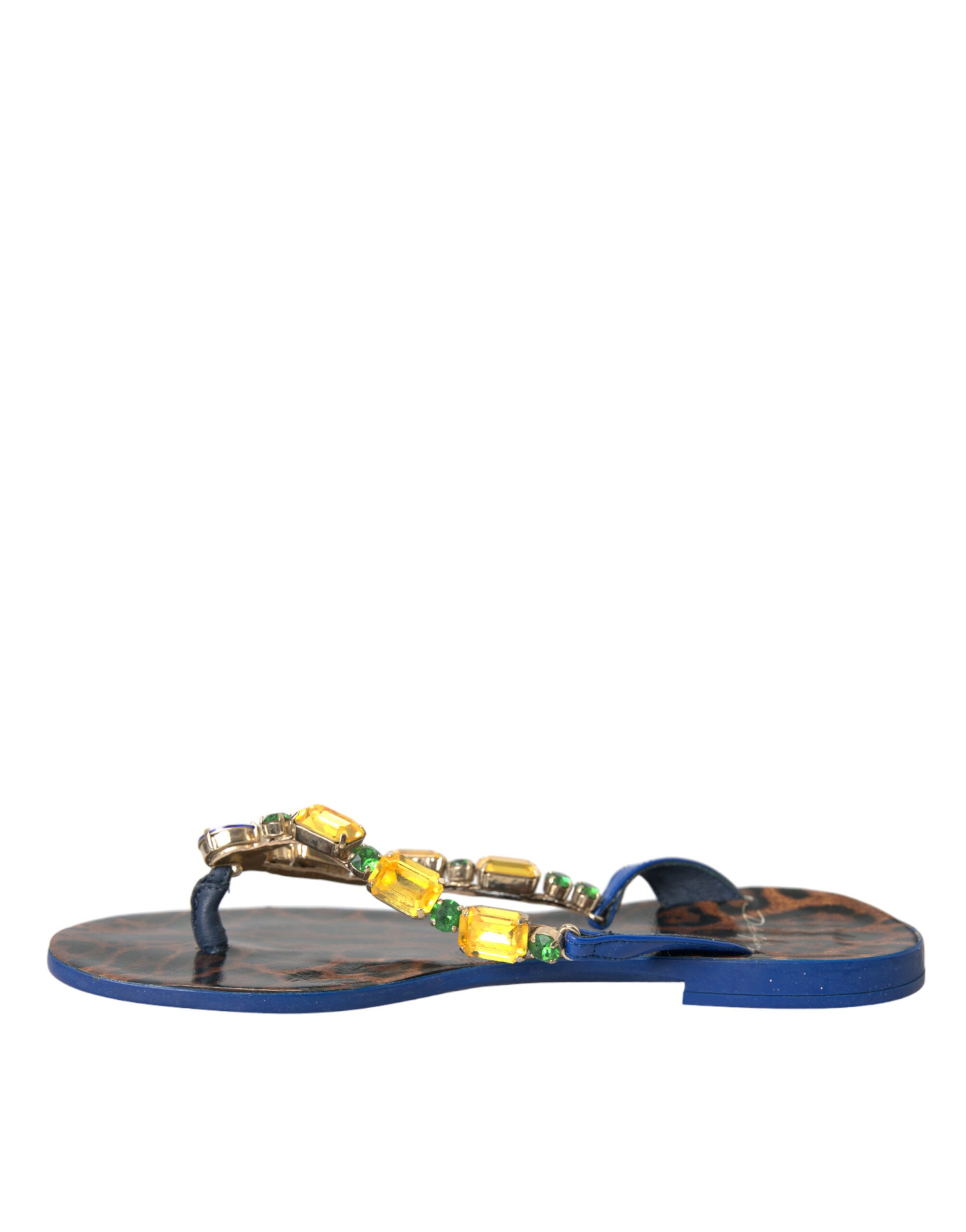 Blå krystallsko i kalveskinn med strandmotiv
