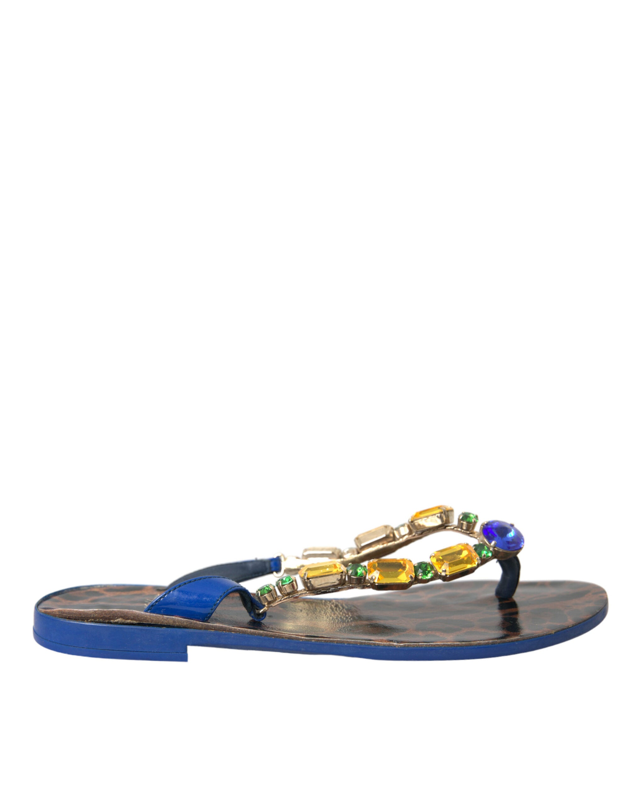 Blå krystallsko i kalveskinn med strandmotiv