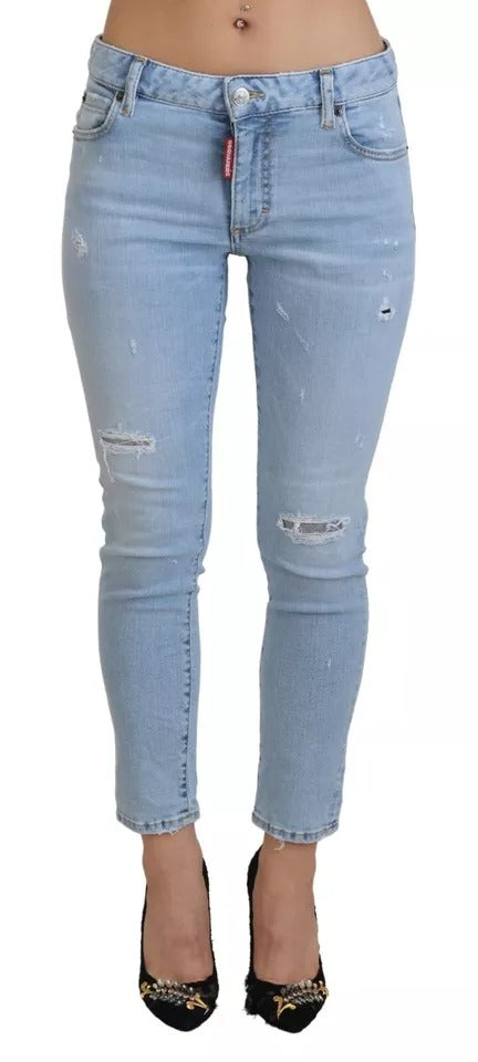 Blåa slitna, korta Twiggy-jeans med medelhög midja