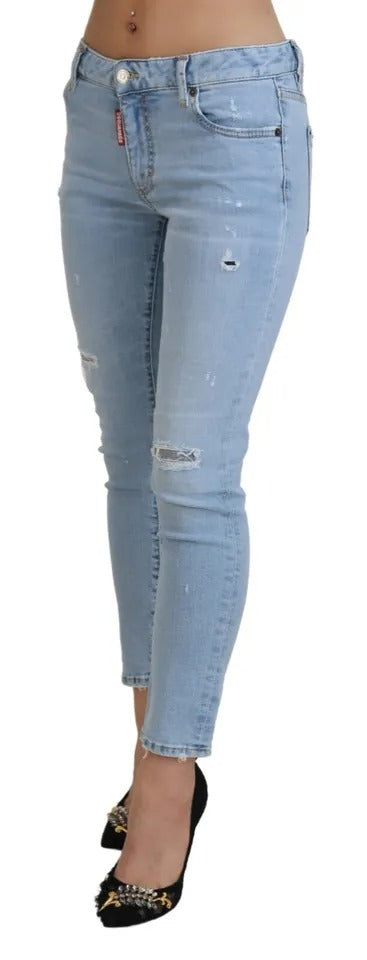 Blåa slitna, korta Twiggy-jeans med medelhög midja
