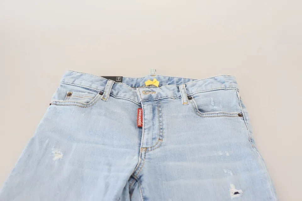 Blåa slitna, korta Twiggy-jeans med medelhög midja