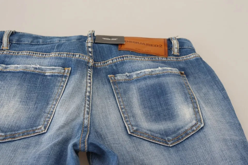 Blå tvättade bomullsjeans med medelhög midja och utsvängda denim