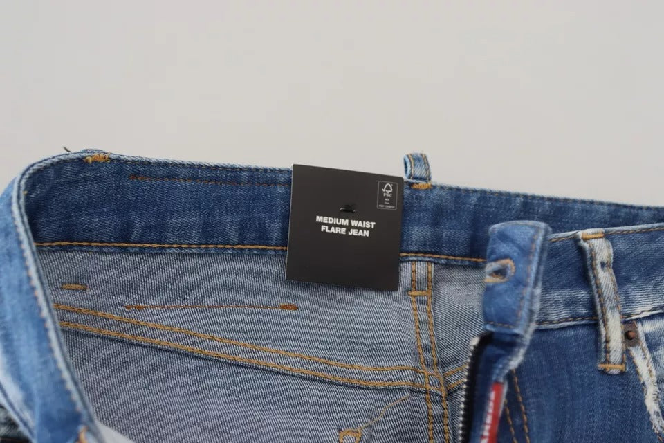 Blå tvättade bomullsjeans med medelhög midja och utsvängda denim