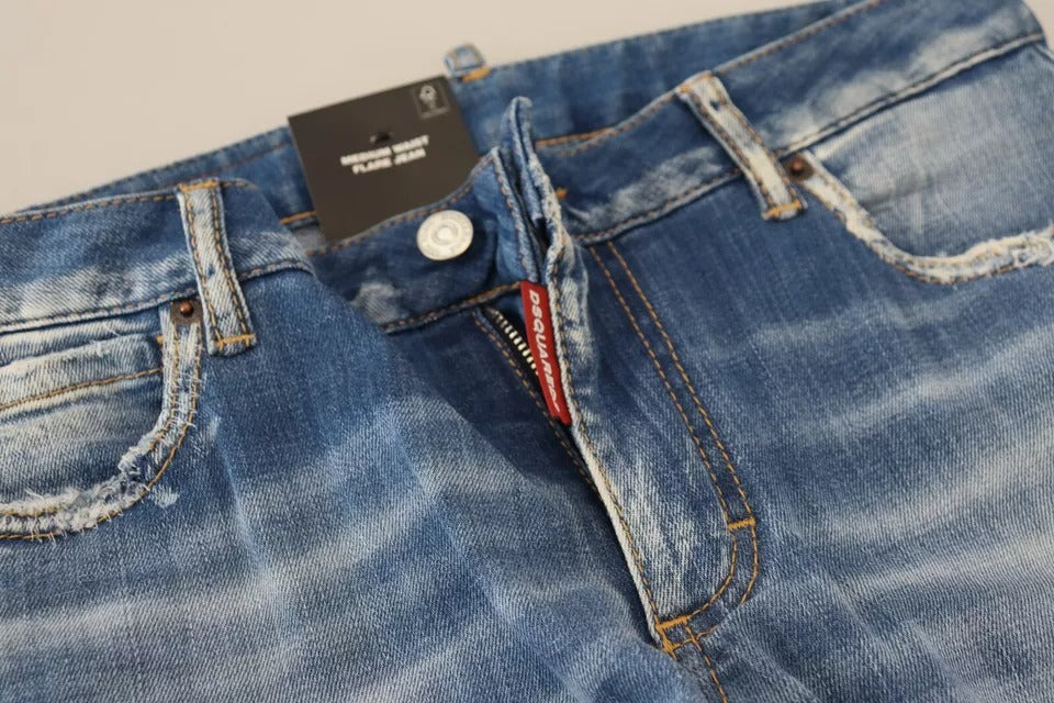 Blå tvättade bomullsjeans med medelhög midja och utsvängda denim