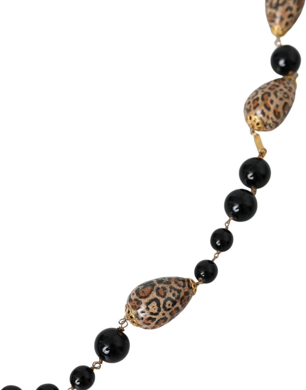Halsband med långt, svart, guldfärgat, pärlmönster och mässingsmönster