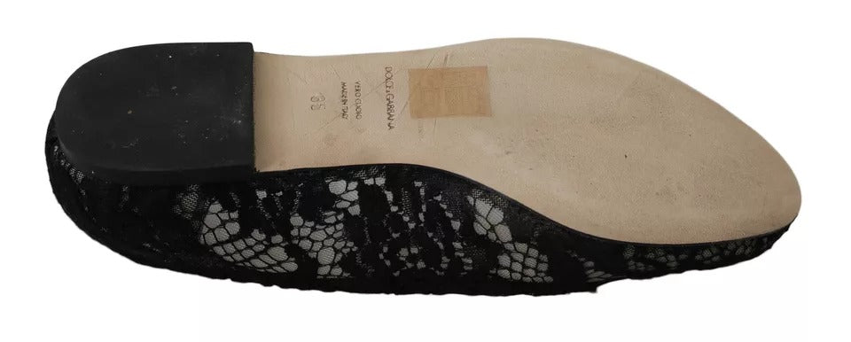 Svarte blomstermønster-loafers med flate sko