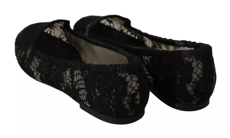 Svarte blomstermønster-loafers med flate sko