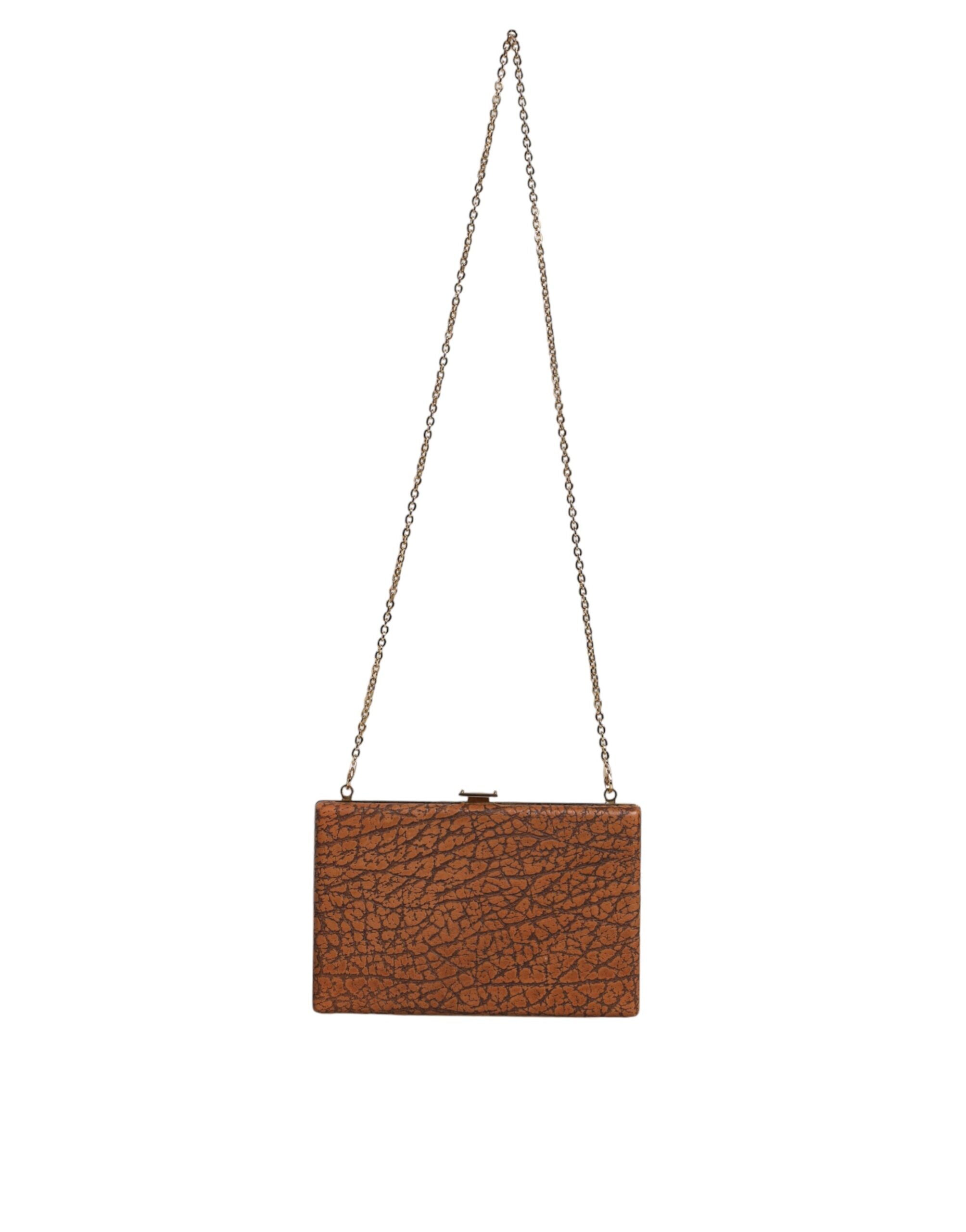 Brun clutch-mini-skulderveske i skinn med gullramme