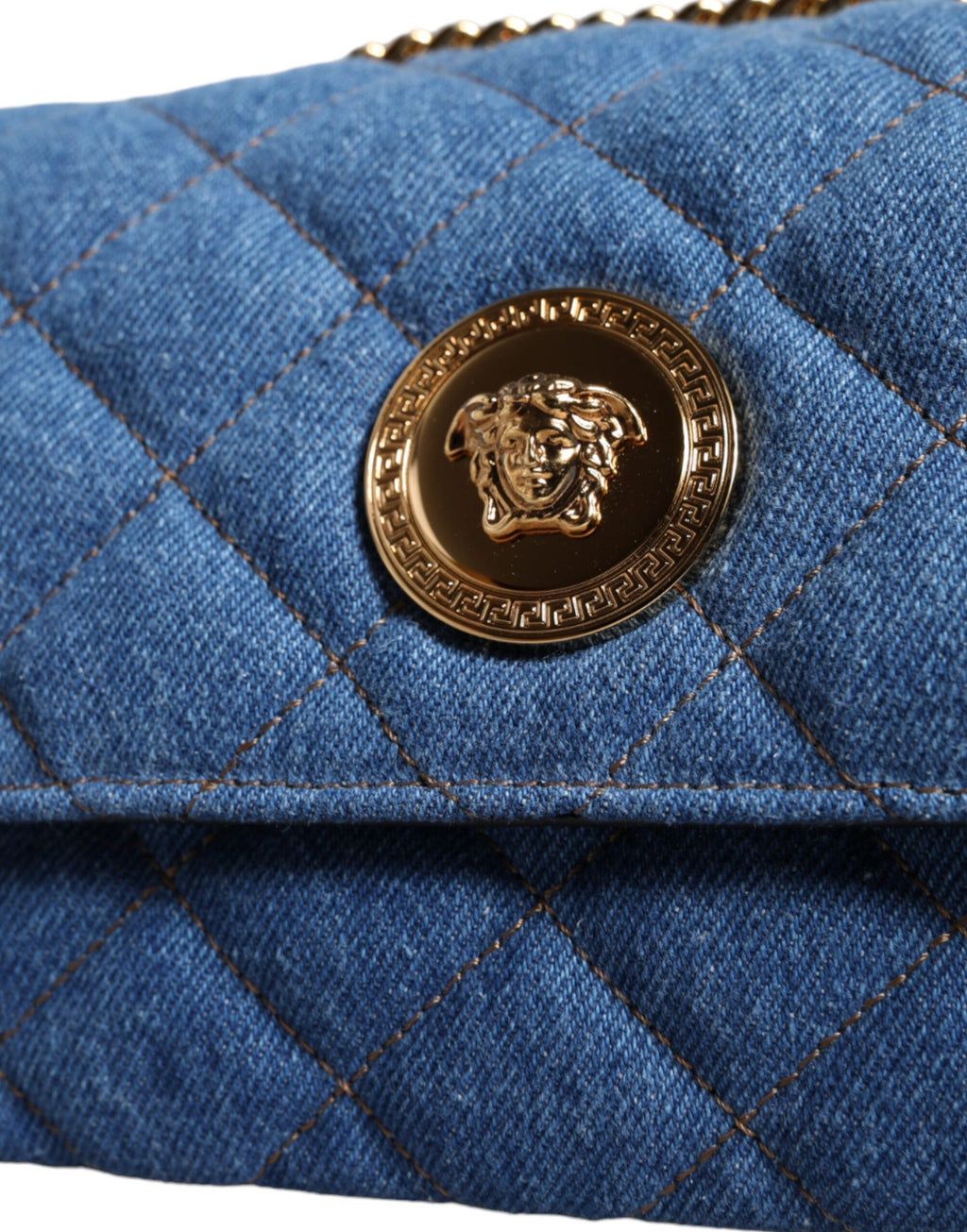 Blå quiltet denim-skulderveske i skinn