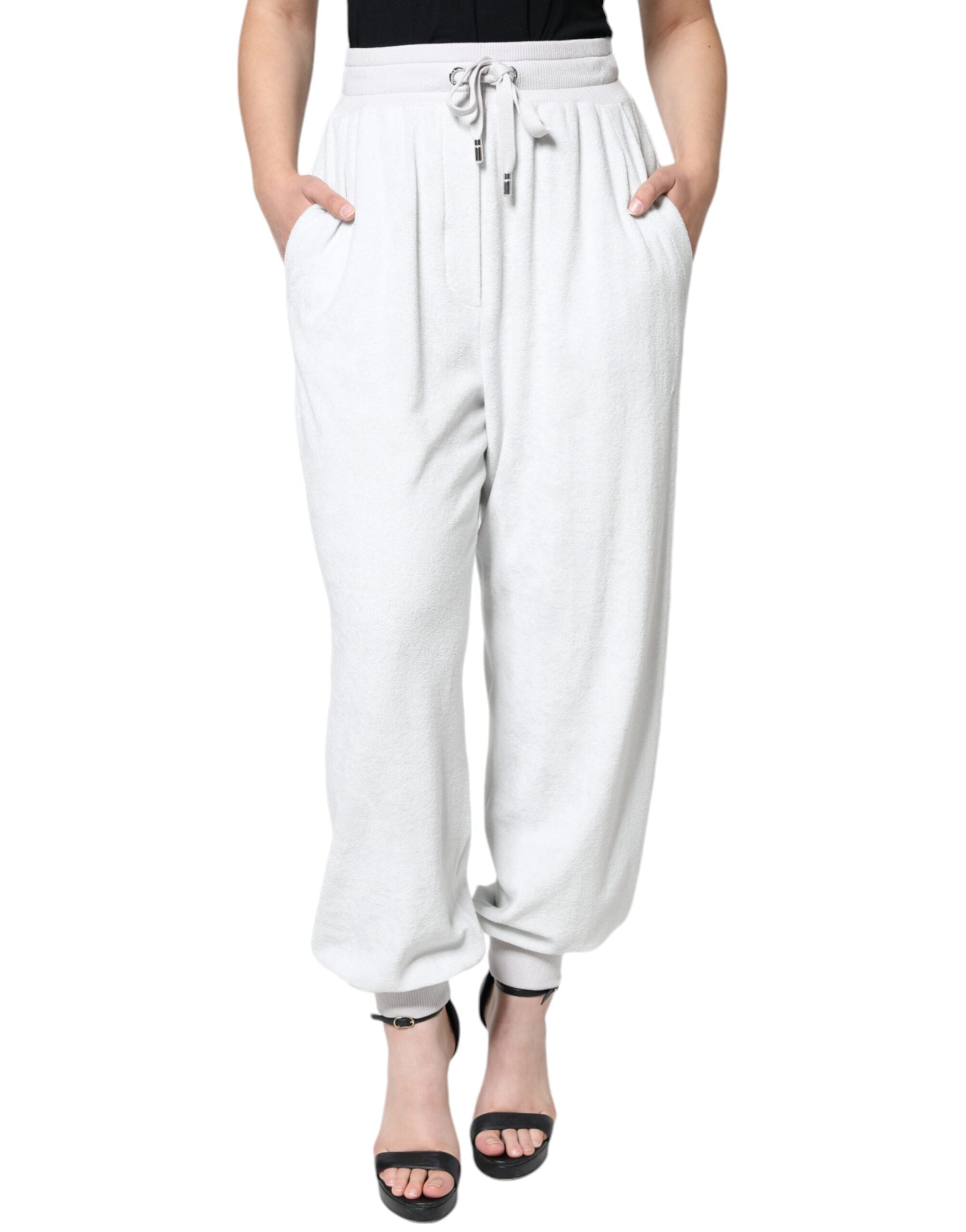 Vita joggingbyxor i nylon