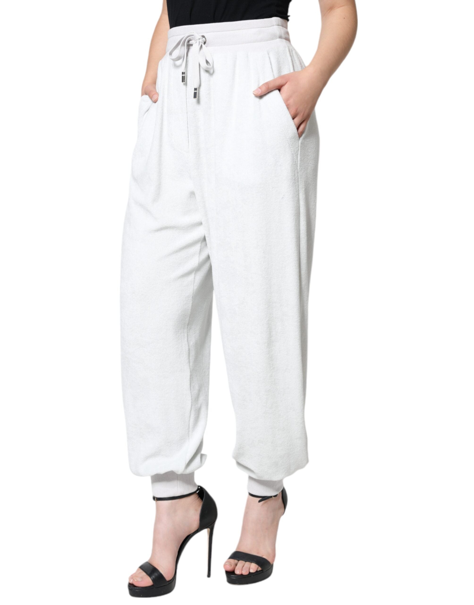 Vita joggingbyxor i nylon