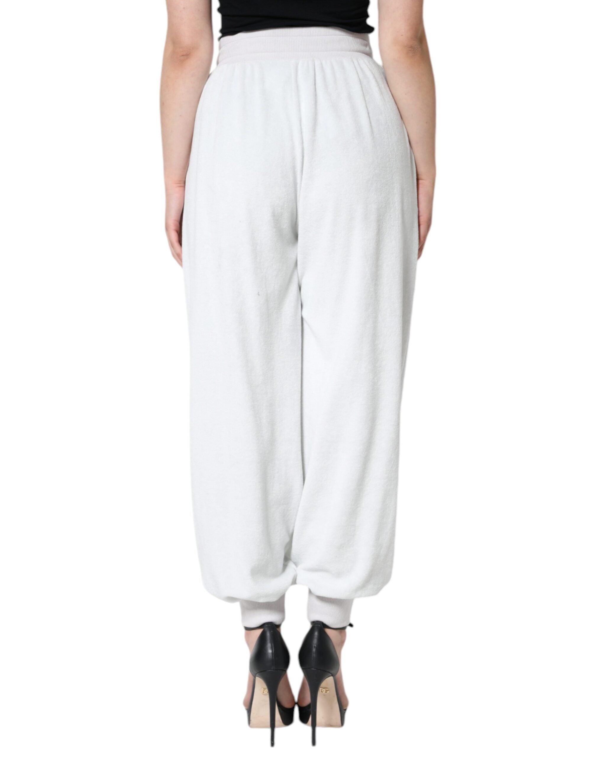 Vita joggingbyxor i nylon